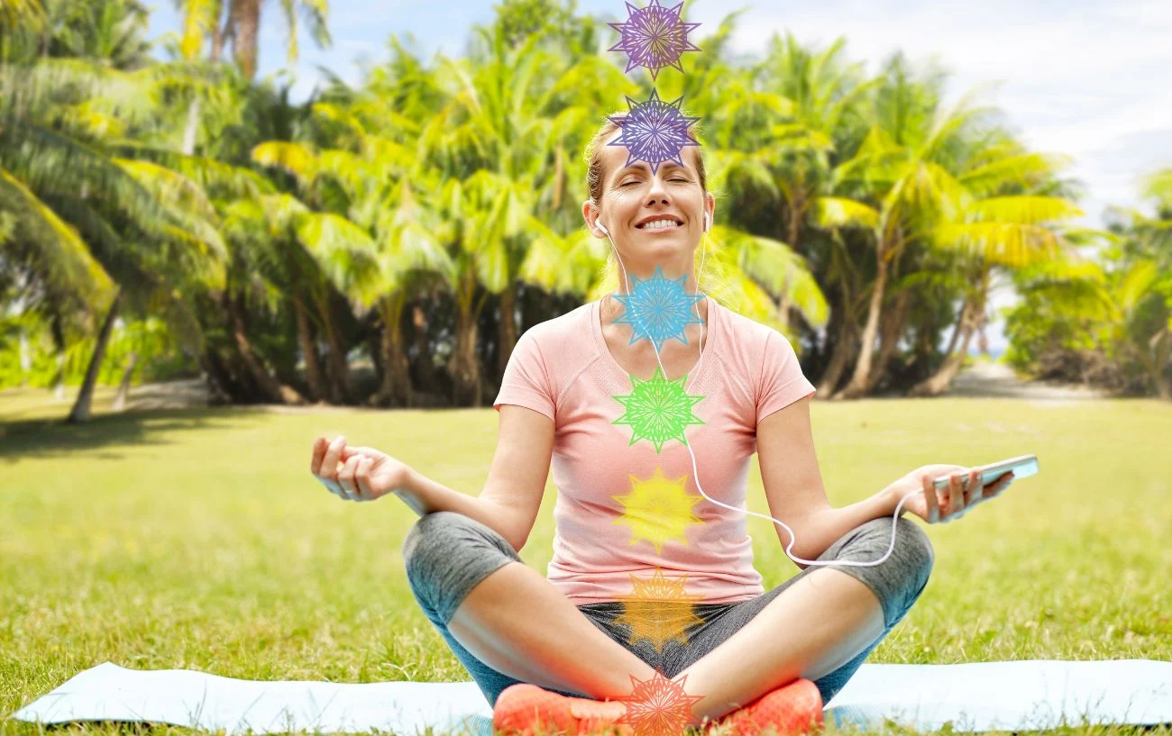Kundalini awakening energy rising through chakras in human spine meditation pose