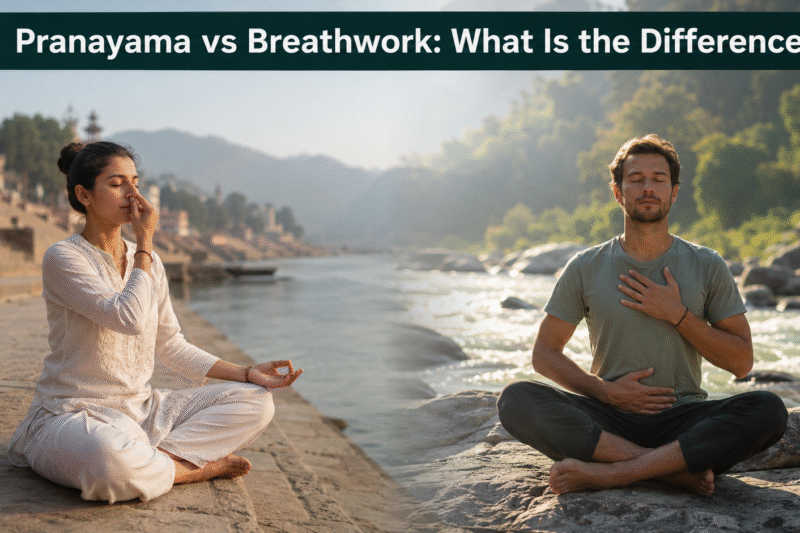 Pranayama vs Breathwork comparison with two people practising mindful breathing beside a peaceful riverside in a natural outdoor setting.